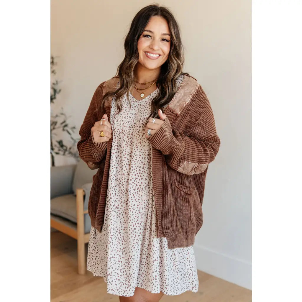 Vintage-inspired plus size friendly cardigan in a vintage brown with cozy knit elbow patches and front pockets. Perfect