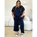 Our Textured Bae Short Sleeve Top and Pants Set is anything but basic. Featuring a drawstring wide leg cropped pant