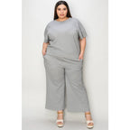 Our Textured Bae Short Sleeve Top and Pants Set is anything but basic. Featuring a drawstring wide leg cropped pant