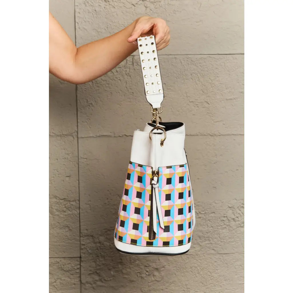 This fantastically fun handbag three piece set includes a Large Shoulder Bag Solid Crossbody and charming Heart Coin