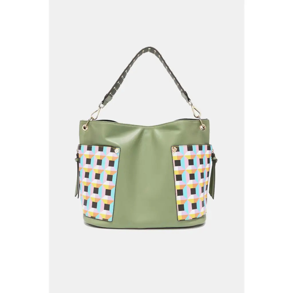 This fantastically fun handbag three piece set includes a Large Shoulder Bag Solid Crossbody and charming Heart Coin