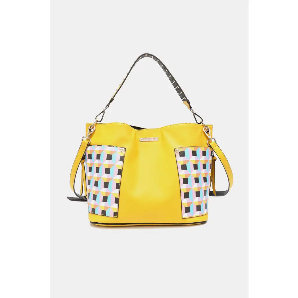 This fantastically fun handbag three piece set includes a Large Shoulder Bag Solid Crossbody and charming Heart Coin