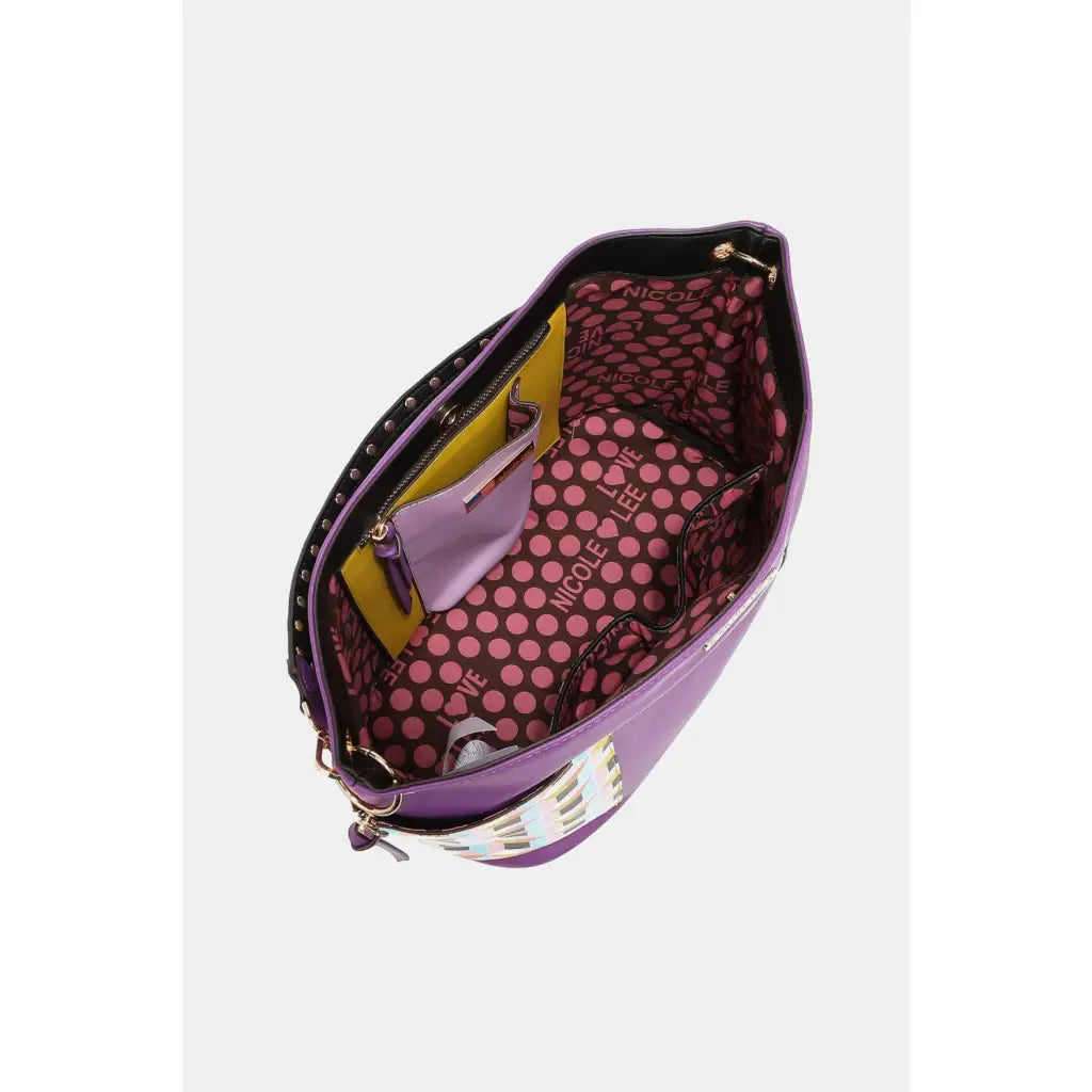 This fantastically fun handbag three piece set includes a Large Shoulder Bag Solid Crossbody and charming Heart Coin