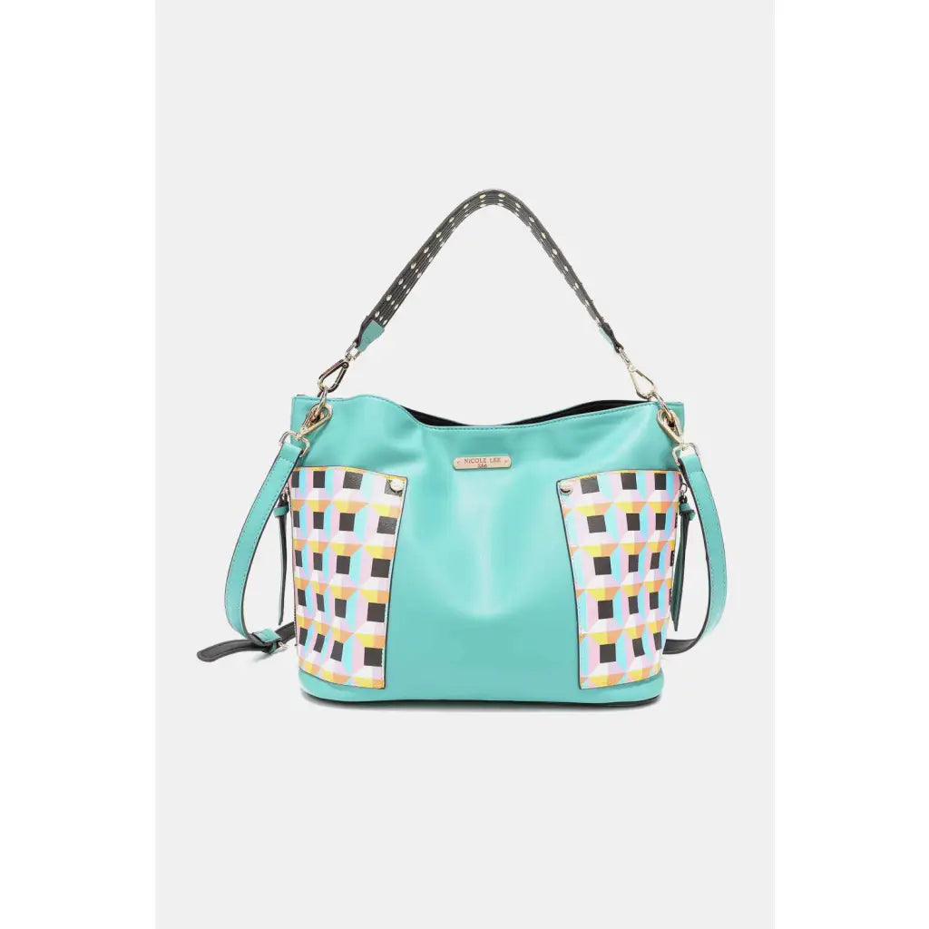 This fantastically fun handbag three piece set includes a Large Shoulder Bag Solid Crossbody and charming Heart Coin