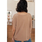 Unleash your style with The Realest V-Neck Top in Shimmering Beige. Made from soft bulgari fabric this top offers