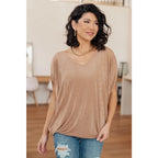 Unleash your style with The Realest V-Neck Top in Shimmering Beige. Made from soft bulgari fabric this top offers