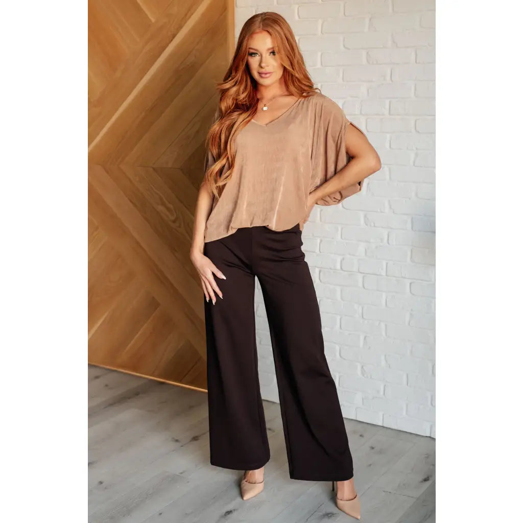 Unleash your style with The Realest V-Neck Top in Shimmering Beige. Made from soft bulgari fabric this top offers