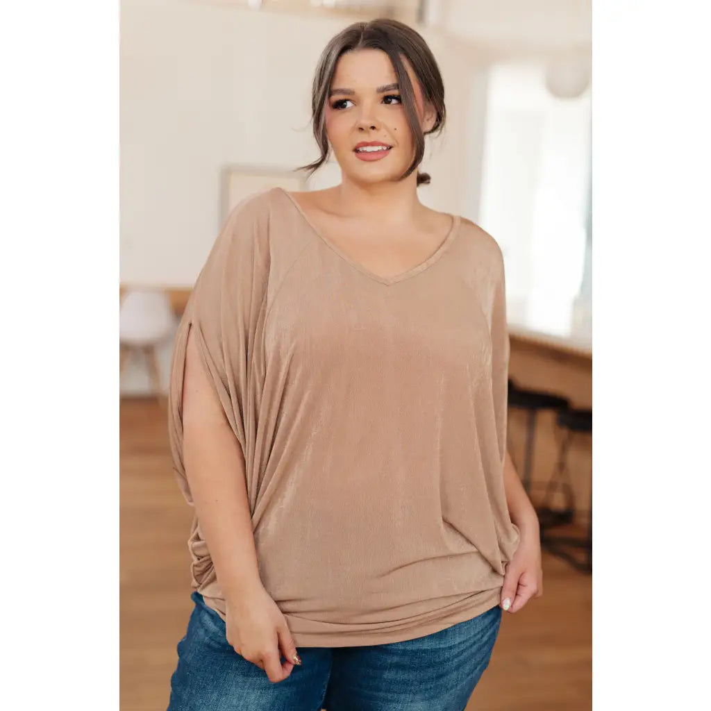 Unleash your style with The Realest V-Neck Top in Shimmering Beige. Made from soft bulgari fabric this top offers