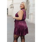 Look and feel your best this season with our Tied In A Bow Purple Velvet Mini Dress! This luxurious sleeveless dress