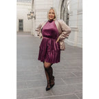 Look and feel your best this season with our Tied In A Bow Purple Velvet Mini Dress! This luxurious sleeveless dress