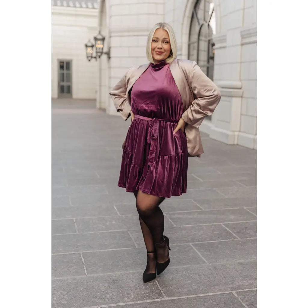 Look and feel your best this season with our Tied In A Bow Purple Velvet Mini Dress! This luxurious sleeveless dress