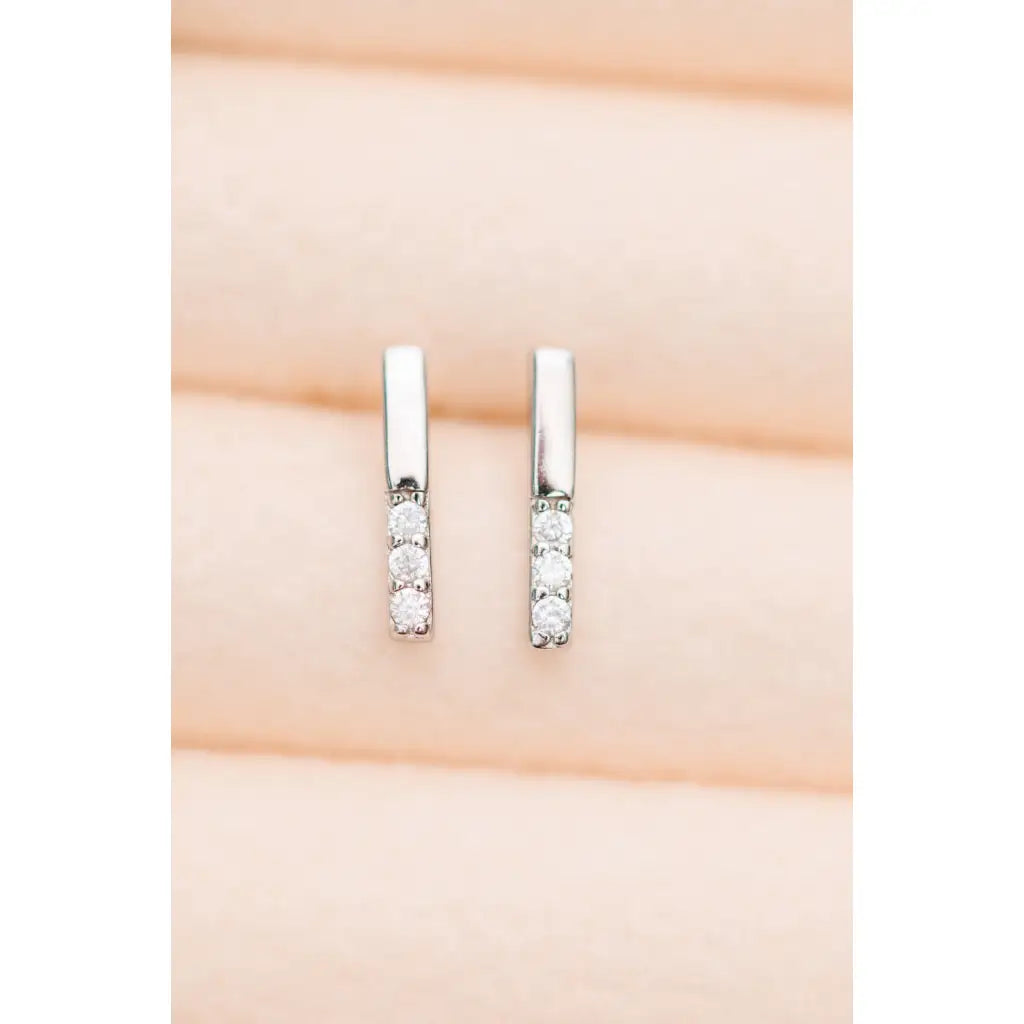 Our Tiny Sparkles Silver Bar Stud Earrings are made with 925 Sterling and Zircon stones for a touch of glamour.