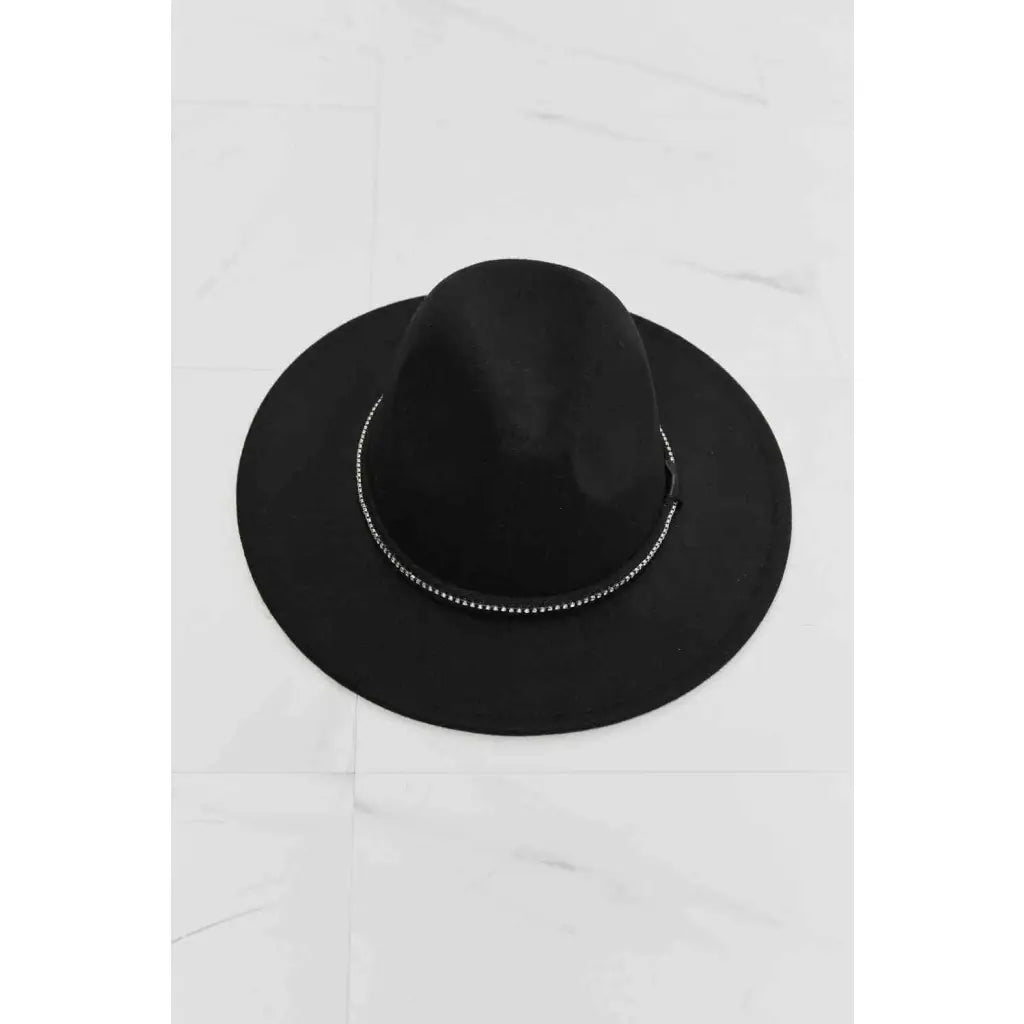 Our Touch of Bling Black Fedora Hat is the perfect accessory for any occasion that requires just a touch sparkle.