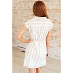 Look stunning in the Twisted and Tailored Vertical Striped Dress! Featuring a knotted front deep v-neck faux wrap. Plus