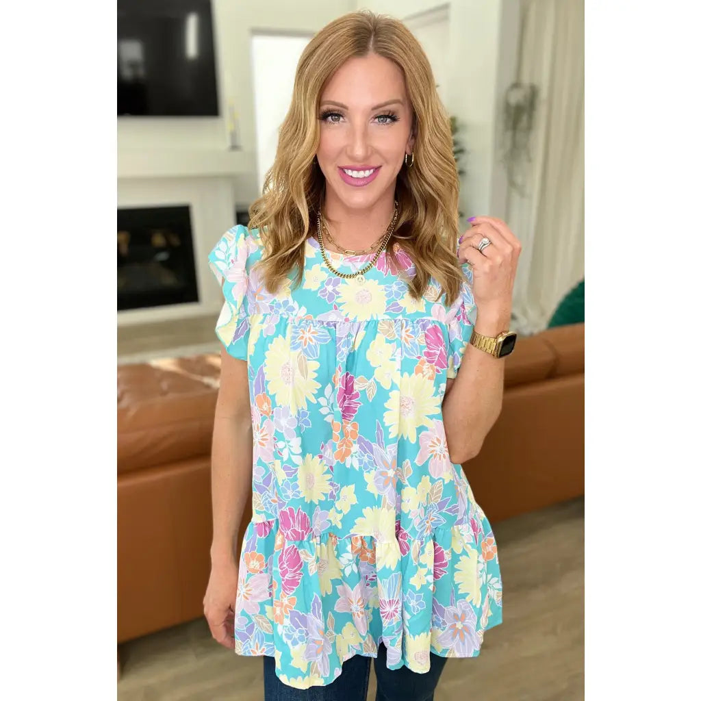 Discover the perfect blend of style and comfort with our Understanding Assignment Floral Babydoll Top in Teal!