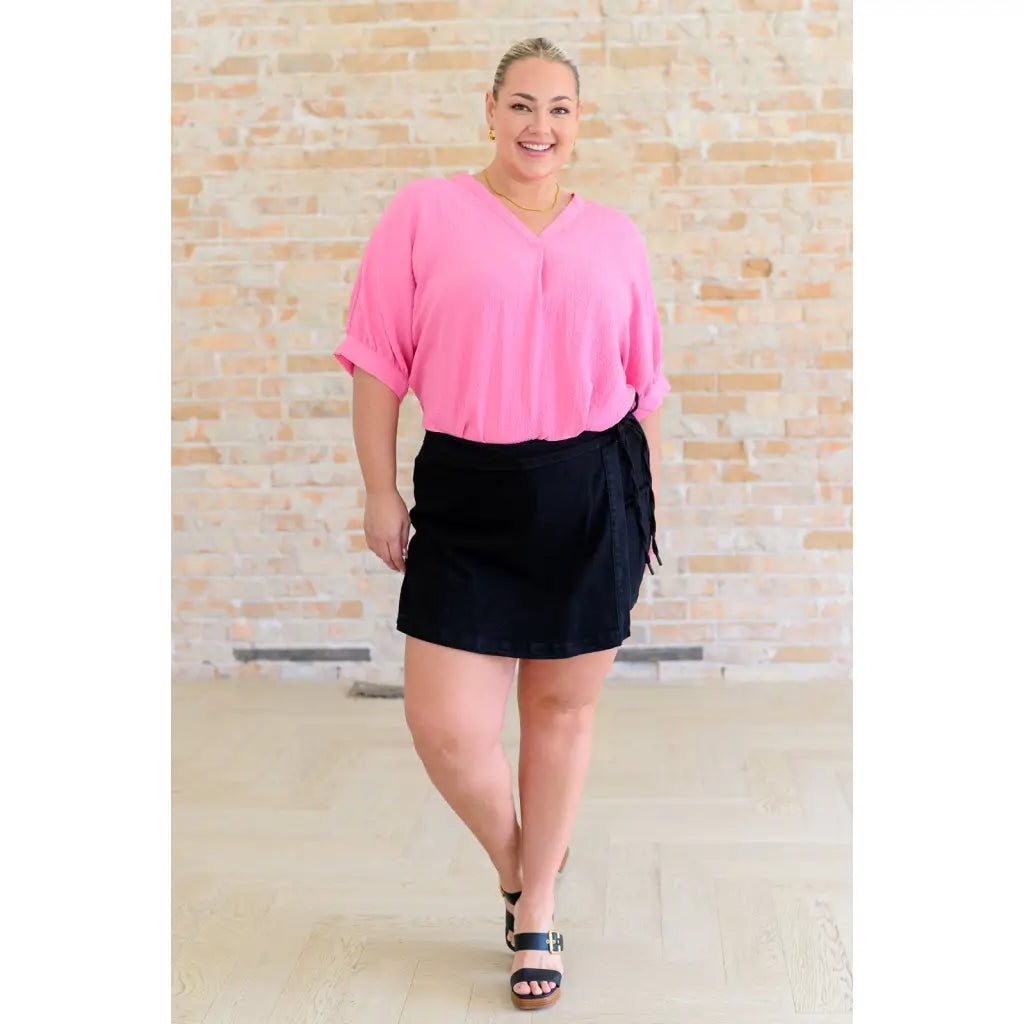 Our Up For Anything V Neck Blouse in Pink is a perfect staple piece for any closet! The crinkle woven fabric adds