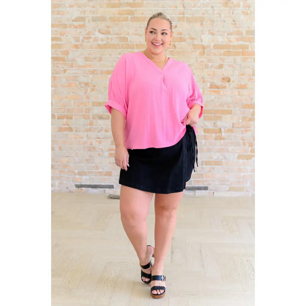Our Up For Anything V Neck Blouse in Pink is a perfect staple piece for any closet! The crinkle woven fabric adds