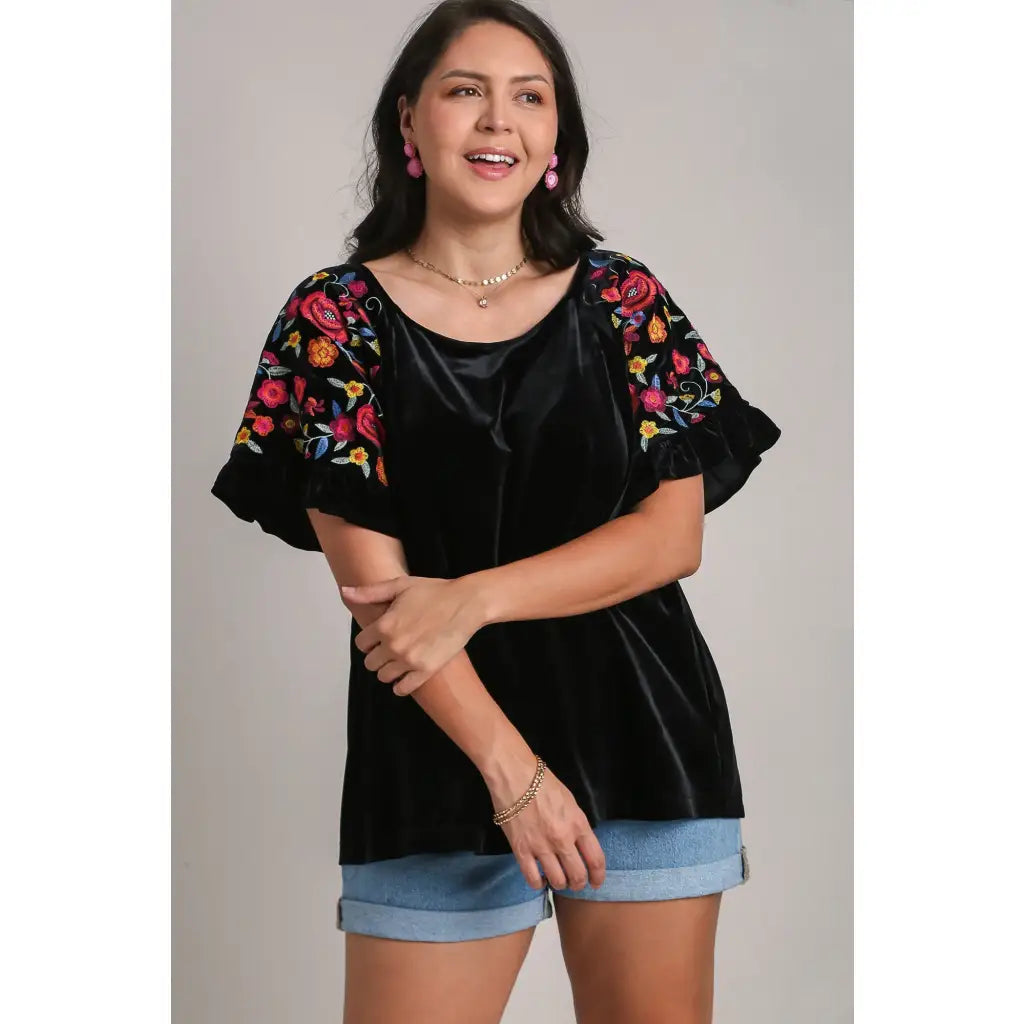 Our Velvet Embroidery Sleeve Blouse in Black is a stunning piece that combines fun look with touch of vintage charm.