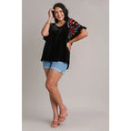 Our Velvet Embroidery Sleeve Blouse in Black is a stunning piece that combines fun look with touch of vintage charm.