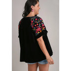 Our Velvet Embroidery Sleeve Blouse in Black is a stunning piece that combines fun look with touch of vintage charm.