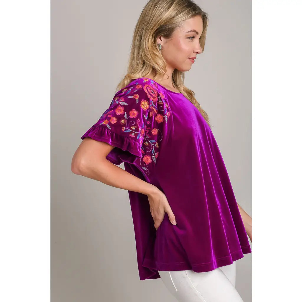 Our Velvet Embroidery Sleeve Blouse in Violet is a stunningly vibrant piece that combines fun look with touch