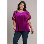 Our Velvet Embroidery Sleeve Blouse in Violet is a stunningly vibrant piece that combines fun look with touch