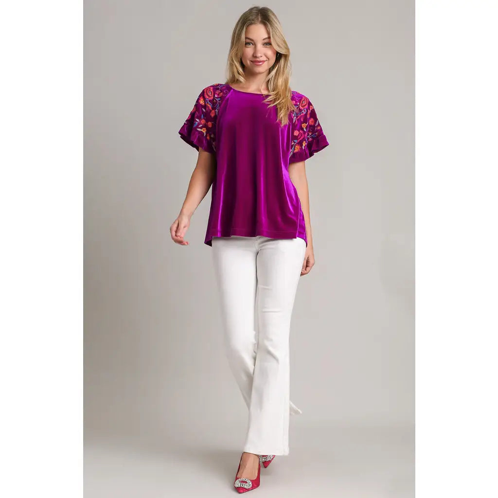 Our Velvet Embroidery Sleeve Blouse in Violet is a stunningly vibrant piece that combines fun look with touch