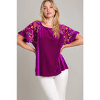 Our Velvet Embroidery Sleeve Blouse in Violet is a stunningly vibrant piece that combines fun look with touch