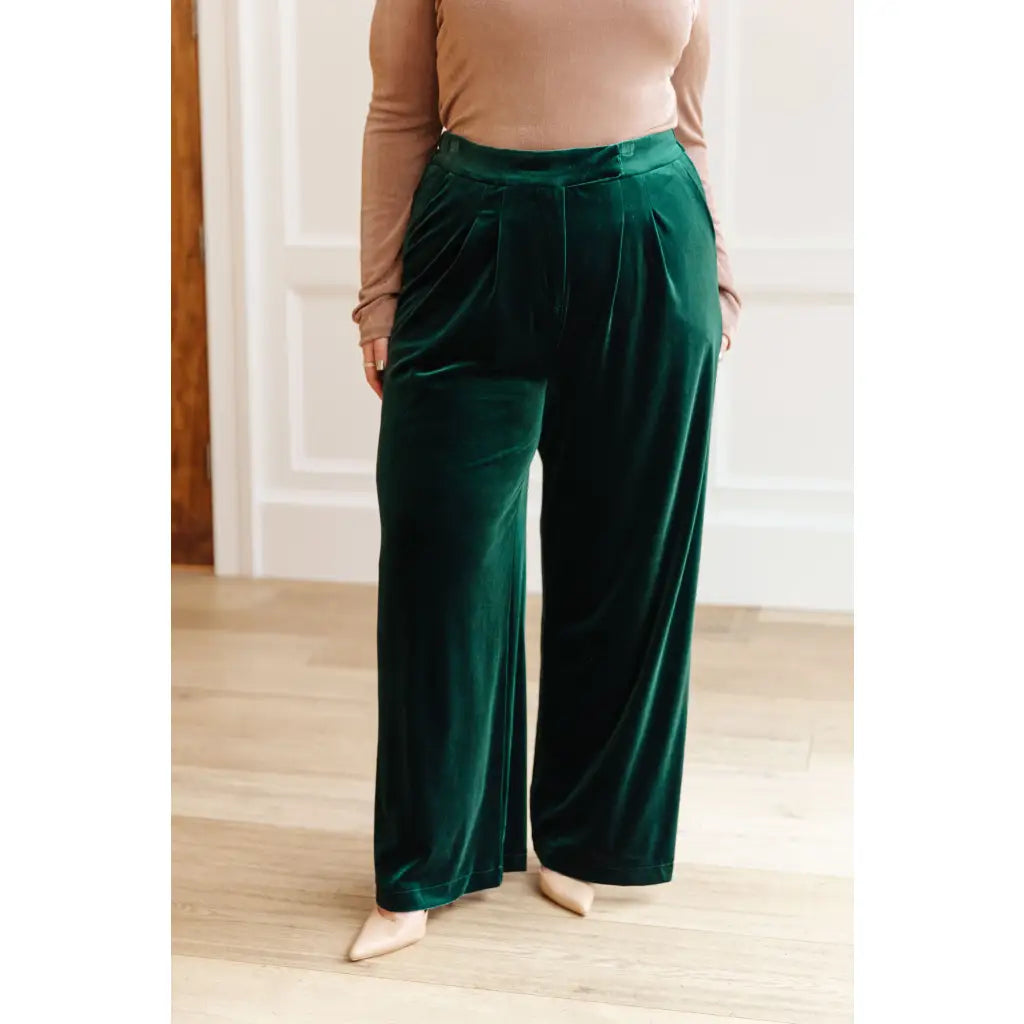 These Velvet Emerald Wide Leg Pants feel ultra-luxe and are guaranteed to make a bold statement. Cut from emerald