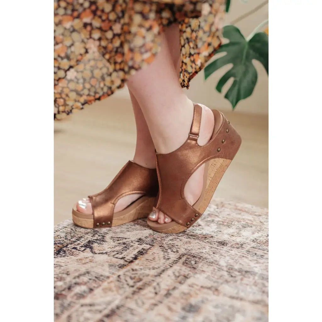 Step into our Walk This Way Wedge Sandals in Antique Bronze by Corkys and experience ultimate all-day comfort