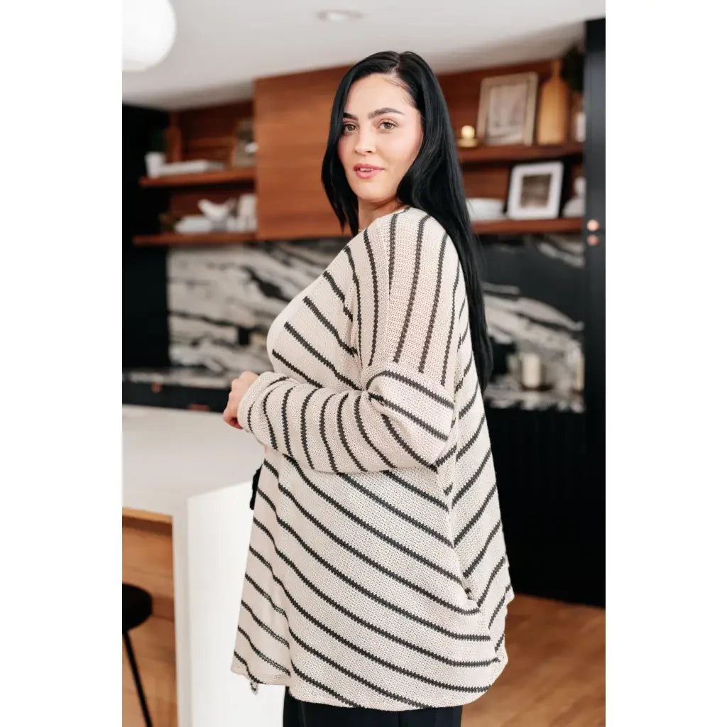 Get ready for a weekend of cozy adventures in our Weekend Adventure Striped Longline Cardigan. Made with soft sweater