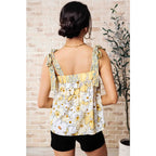 Our What’s Happening Here Yellow Floral Tank is playful and feminine! It features a woven fabric functional shoulder