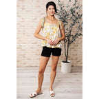 Our What’s Happening Here Yellow Floral Tank is playful and feminine! It features a woven fabric functional shoulder