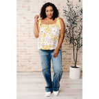 Our What’s Happening Here Yellow Floral Tank is playful and feminine! It features a woven fabric functional shoulder