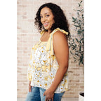 Our What’s Happening Here Yellow Floral Tank is playful and feminine! It features a woven fabric functional shoulder