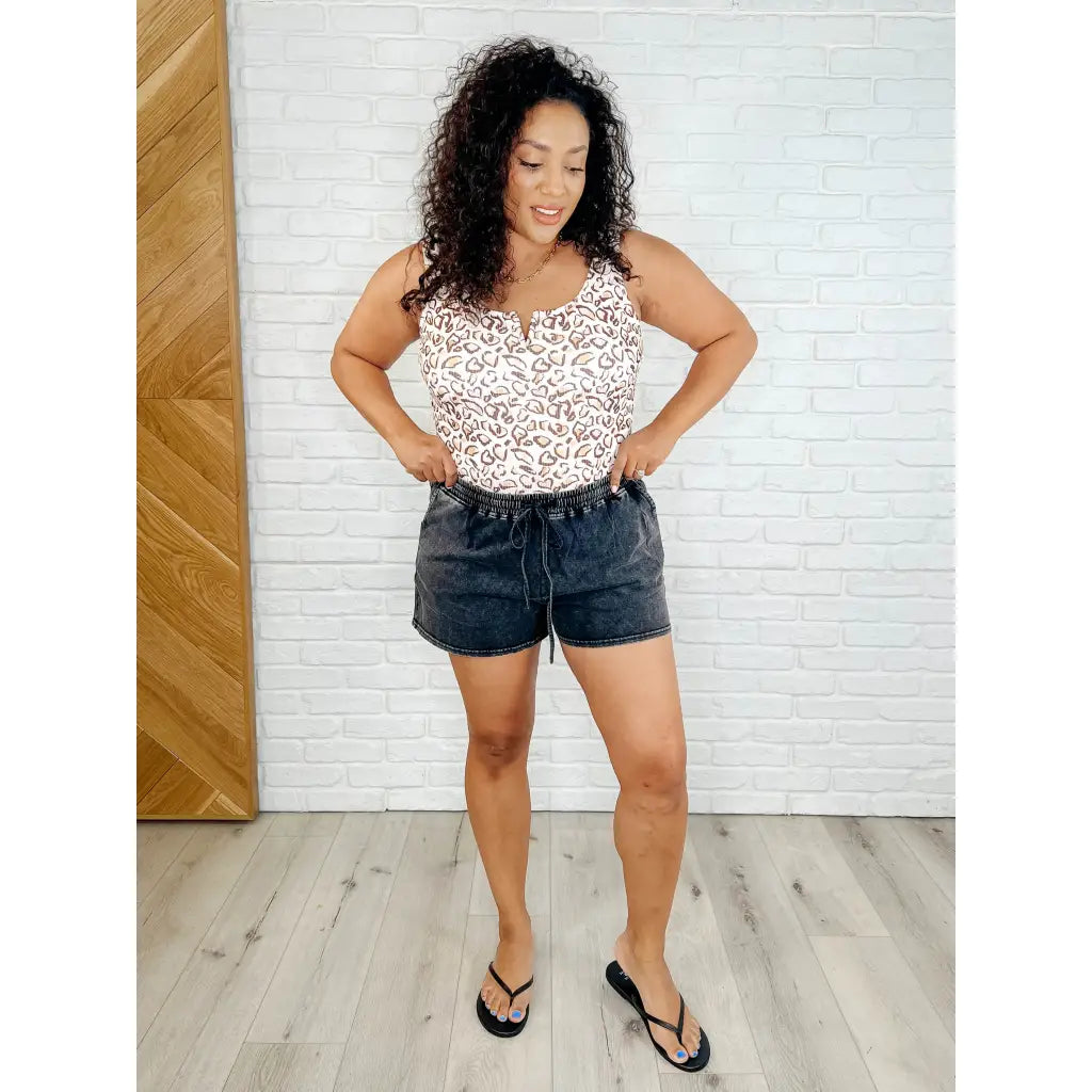 Leopard print one-piece with a notched neckline and scoop back. Ribbed fully lined plus size swimwear made to slay all