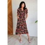 Our Wildflower and Barley V-Neck Button Up Dress is crafted from a stunning black floral printed textured woven fabric.