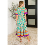 Brighten your wardrobe with the Mint to Be Flutter Dress — bold florals mint green base and plus size friendly. Style