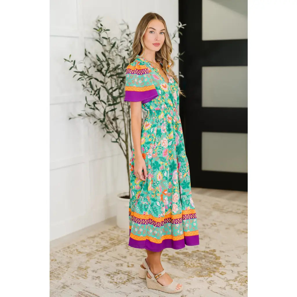 Brighten your wardrobe with the Mint to Be Flutter Dress — bold florals mint green base and plus size friendly. Style