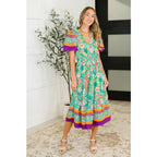 Brighten your wardrobe with the Mint to Be Flutter Dress — bold florals mint green base and plus size friendly. Style