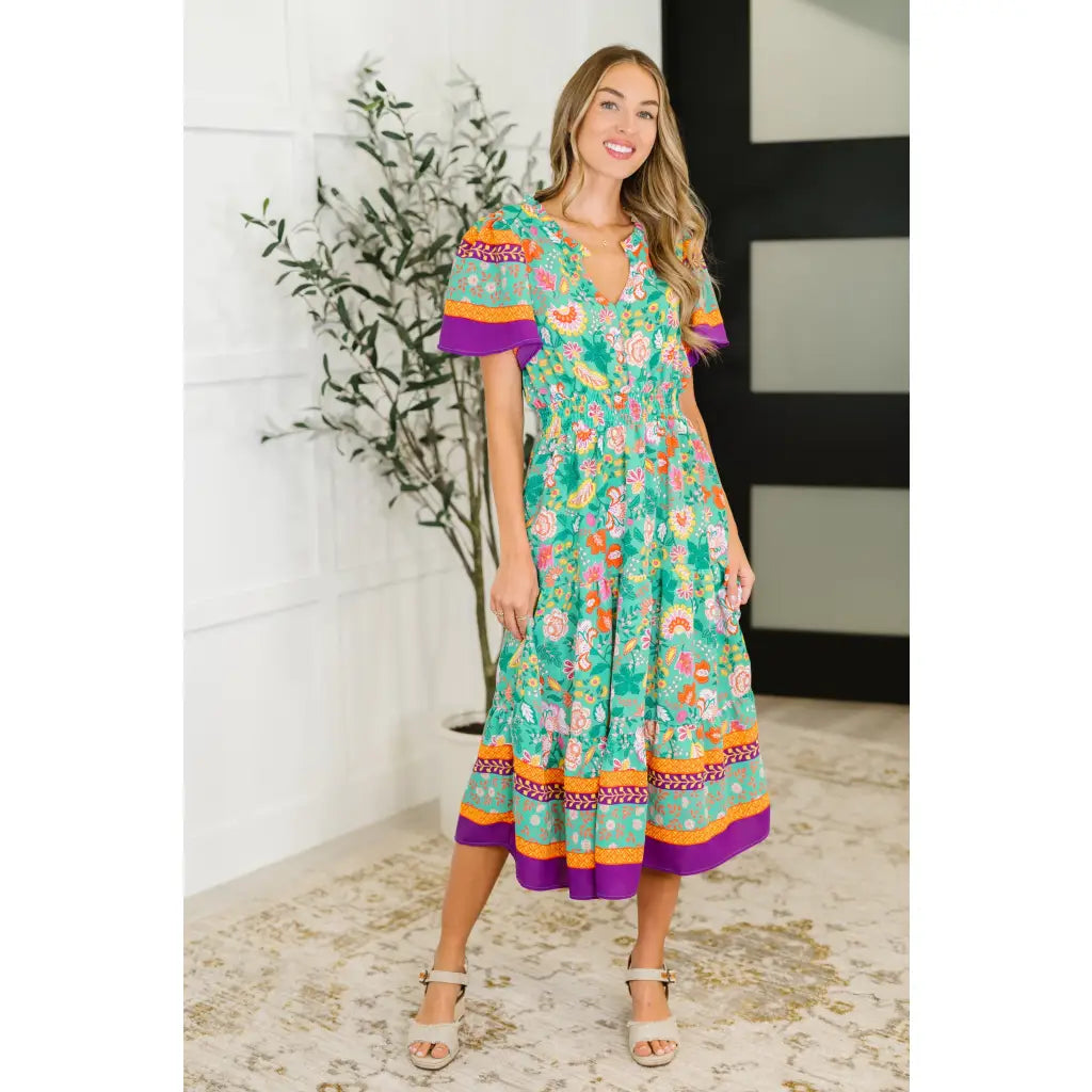 Brighten your wardrobe with the Mint to Be Flutter Dress — bold florals mint green base and plus size friendly. Style