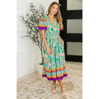 Brighten your wardrobe with the Mint to Be Flutter Dress — bold florals mint green base and plus size friendly. Style