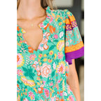 Brighten your wardrobe with the Mint to Be Flutter Dress — bold florals mint green base and plus size friendly. Style