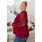 Flowy and oversized wine lace blouse with mock neck sleeves. Plus size friendly perfect for layering brunch looks