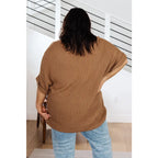 Our comfy oversized Wonder Why Oversized Short Sleeve Sweater is constructed with a lightweight caramel mocha knit