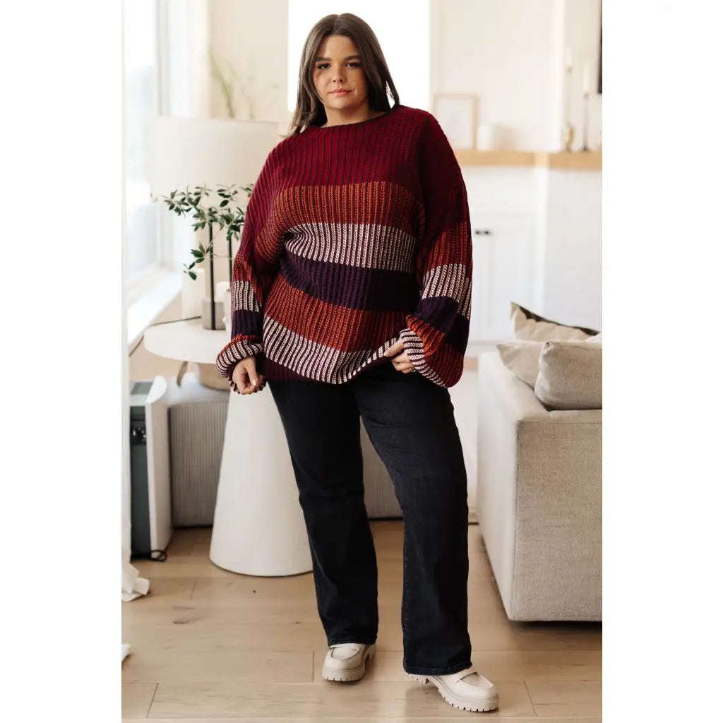 Stay cozy this season in our Wonderful World Striped Sweater. Featuring an oversized fit crew neckline dropped