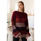 Stay cozy this season in our Wonderful World Striped Sweater. Featuring an oversized fit crew neckline dropped