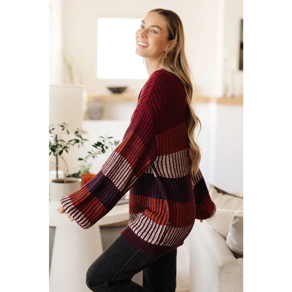 Stay cozy this season in our Wonderful World Striped Sweater. Featuring an oversized fit crew neckline dropped