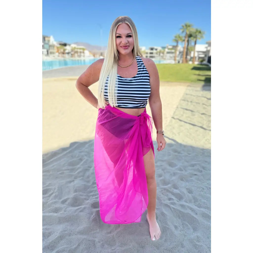 Make a bold statement in this fuchsia swim cover-up. Lightweight chiffon plus size friendly and perfect for versatile