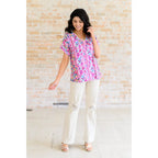 Our Yours Truly V-Neck Top in Magenta features woven fabric is lightweight and perfect for warm weather! The dolman